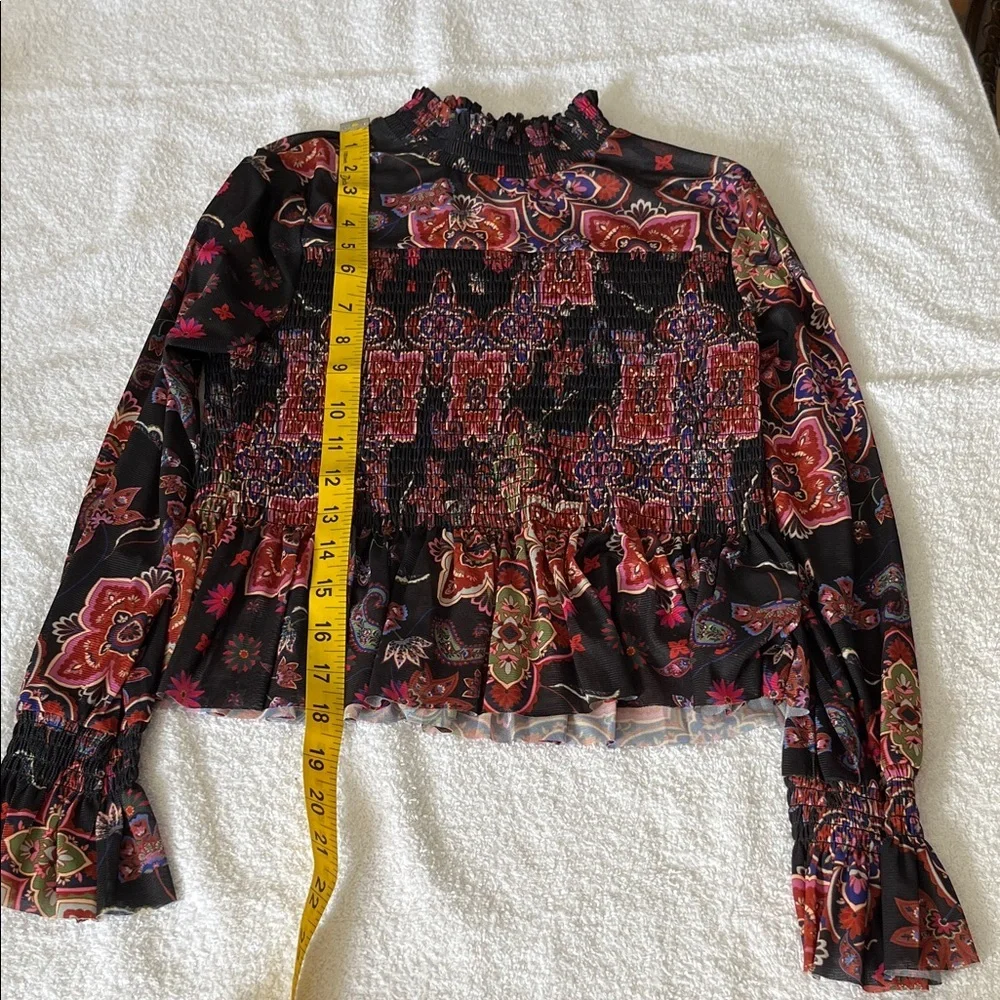 Chelsea & Violet Black Floral Smocked Peplum Blouse